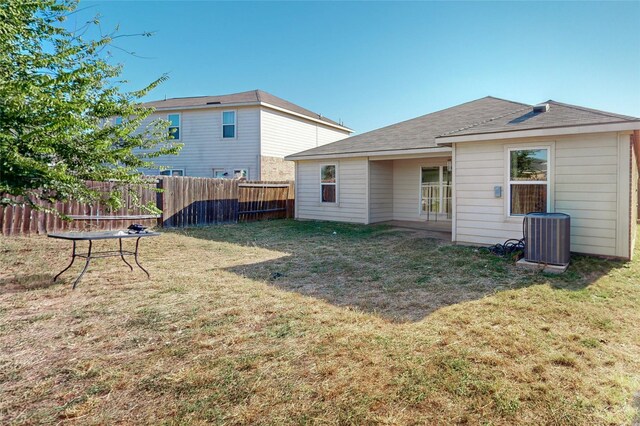 6133 Chalk Hollow Dr, Fort Worth, TX 76179 - back of house featuring central air condition unit and roof with shingles
