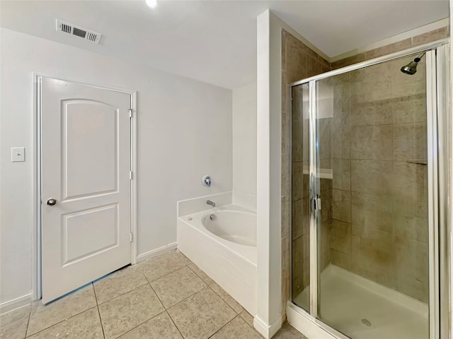 6133 Chalk Hollow Dr, Fort Worth, TX 76179 - full bathroom featuring a stall shower, a garden tub, tile patterned floors, and baseboards