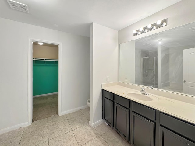 6133 Chalk Hollow Dr, Fort Worth, TX 76179 - full bath with toilet, vanity, a shower stall, tile patterned floors, and baseboards