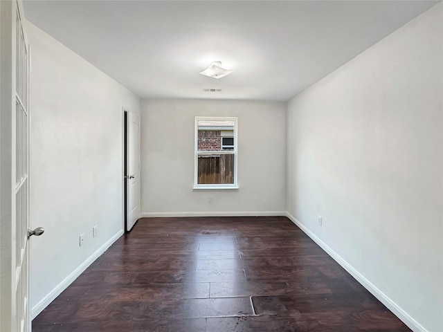 6133 Chalk Hollow Dr, Fort Worth, TX 76179 - spare room featuring baseboards and wood finished floors