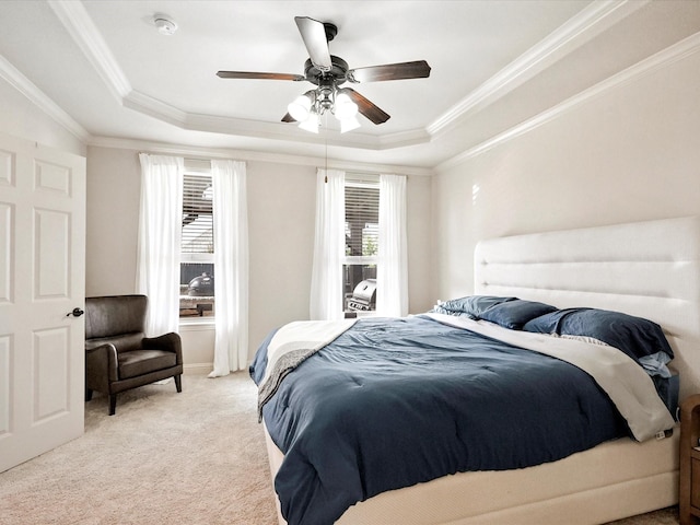2505 Trailhead Dr, Fort Worth, TX 76177 - bedroom featuring a tray ceiling, multiple windows, light colored carpet, ornamental molding, and ceiling fan