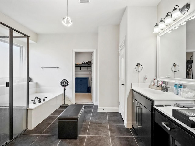 2505 Trailhead Dr, Fort Worth, TX 76177 - full bath featuring a garden tub, double vanity, a spacious closet, tile patterned flooring, and a shower stall