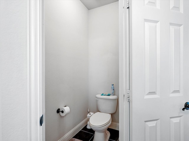 2505 Trailhead Dr, Fort Worth, TX 76177 - bathroom with tile patterned floors, toilet, and baseboards