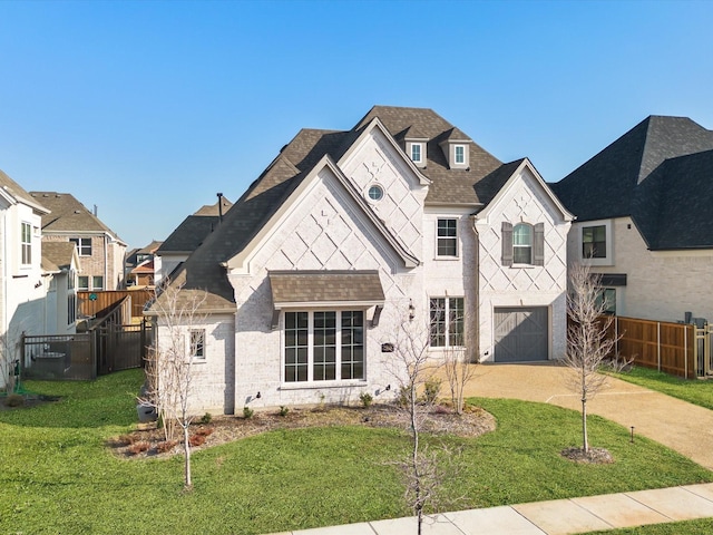 2448 Haft River Rd, Frisco, TX 75034 - french country home with a garage, a shingled roof, and driveway