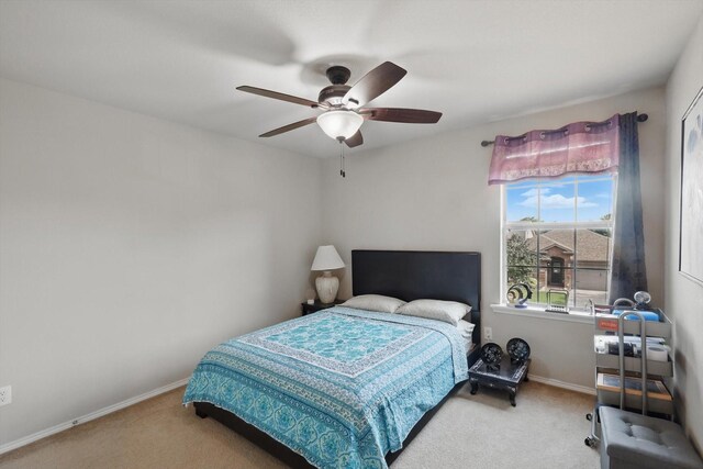 1717 Quail Grove Dr, Fort Worth, TX 76177 - carpeted bedroom featuring baseboards and a ceiling fan