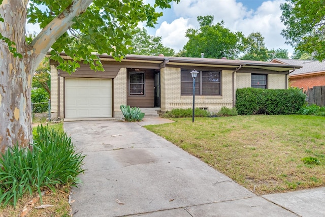 2109 Blake Ave, Dallas, TX 75228 - ranch-style home featuring a garage, brick siding, and driveway