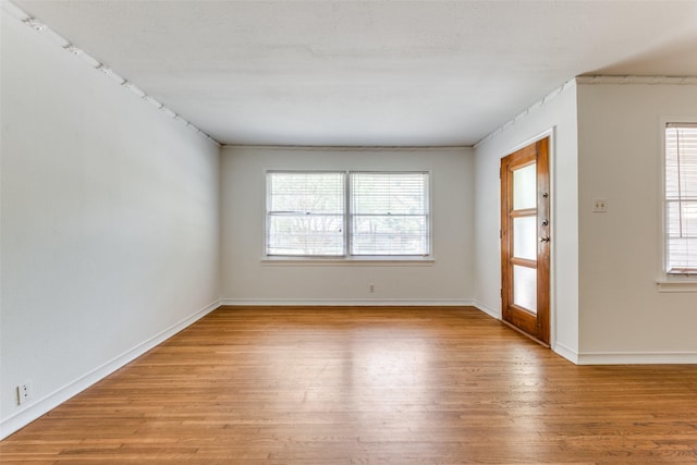 2109 Blake Ave, Dallas, TX 75228 - entrance foyer featuring light wood-type flooring and baseboards
