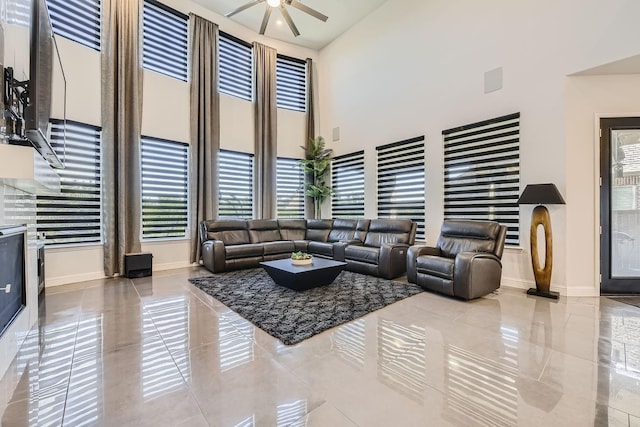 3509 Meridian Dr, Northlake, TX 76226 - living area featuring a towering ceiling, a ceiling fan, and tile patterned floors