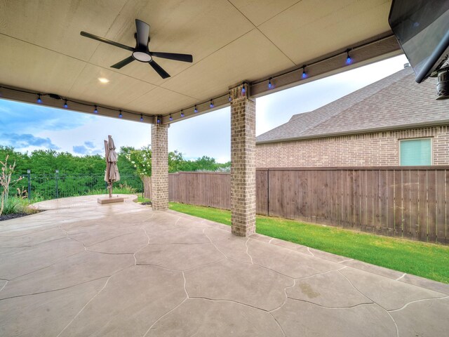 3509 Meridian Dr, Northlake, TX 76226 - fenced backyard featuring ceiling fan and a patio