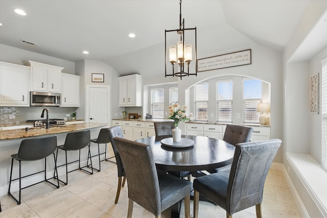 1430 Crescent Valley Dr, Prosper, TX 75078 - dining room with recessed lighting, a chandelier, light tile patterned floors, and lofted ceiling