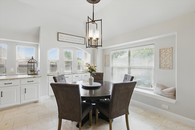 1430 Crescent Valley Dr, Prosper, TX 75078 - dining area featuring a chandelier, high vaulted ceiling, and baseboards