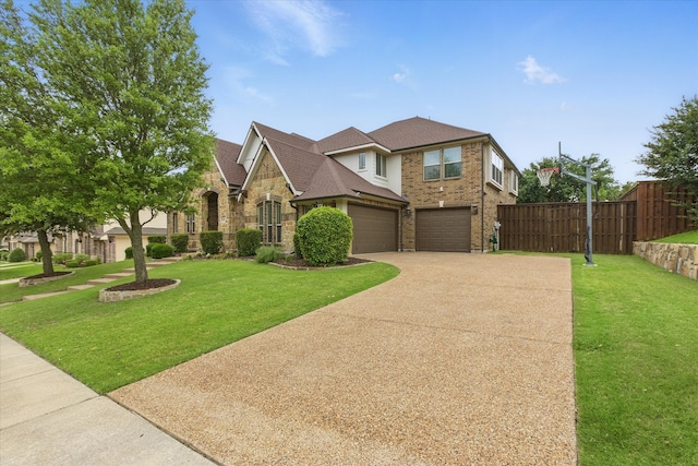 1430 Crescent Valley Dr, Prosper, TX 75078 - view of front of property featuring driveway, stone siding, a garage, brick siding, and roof with shingles