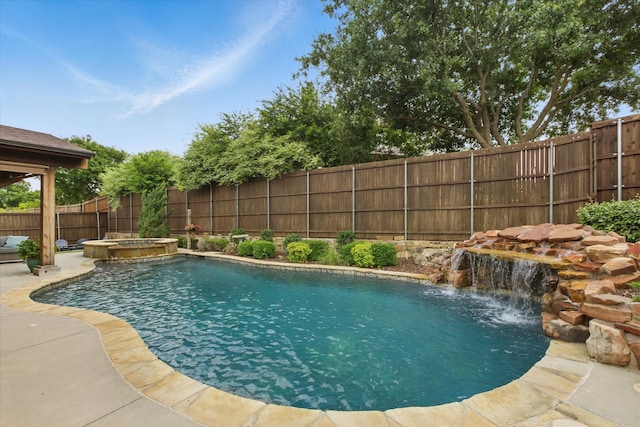 1430 Crescent Valley Dr, Prosper, TX 75078 - view of pool with a fenced backyard, a pool with connected hot tub, and a patio area