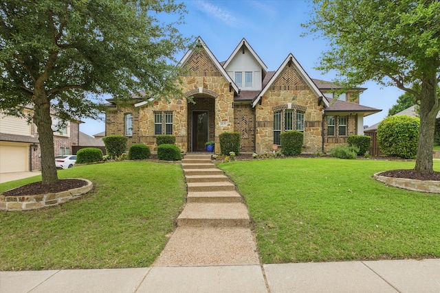 1430 Crescent Valley Dr, Prosper, TX 75078 - english style home with stone siding and a front yard