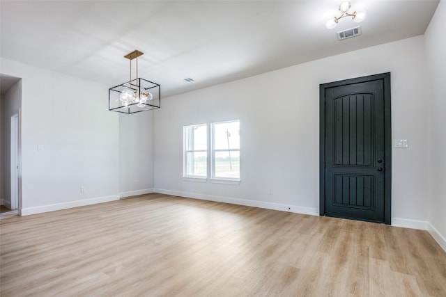 1450 W Fm 550, Mclendon Chisholm, TX 75032 - entrance foyer with light wood-style floors, a chandelier, and baseboards
