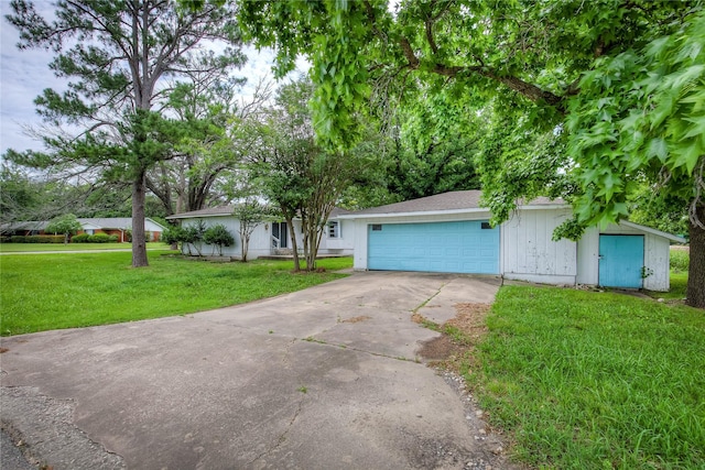 201 Brookhaven Ter, Commerce, TX 75428 - view of front of property with driveway, a front yard, and an attached garage