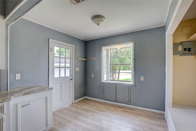 201 Brookhaven Ter, Commerce, TX 75428 - entryway featuring light wood-type flooring, crown molding, and baseboards