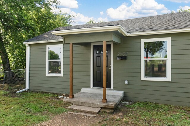 2508 Windsor Ave, Waco, TX 76708 - doorway to property featuring a shingled roof