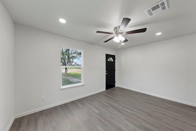 2508 Windsor Ave, Waco, TX 76708 - unfurnished room featuring dark wood-style flooring, recessed lighting, baseboards, and ceiling fan