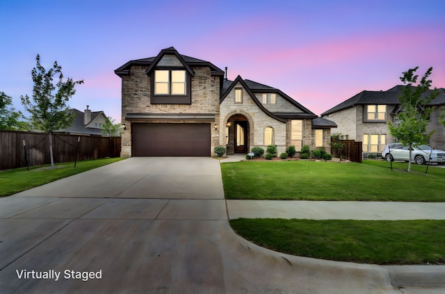 2417 Warrington Pl, Mansfield, TX 76084 - french country home featuring an attached garage, driveway, and stone siding