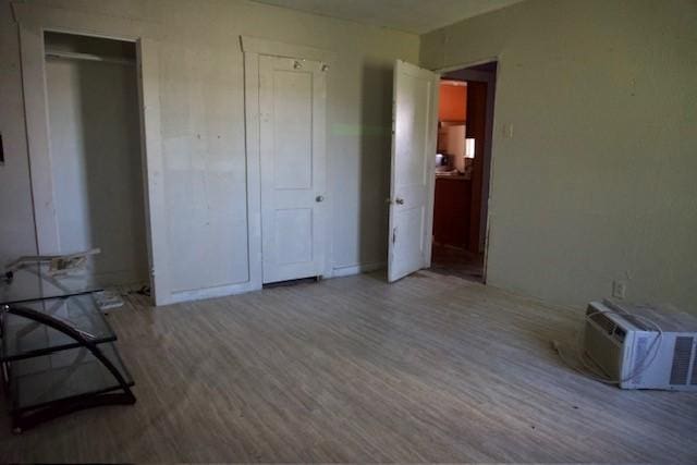 3409 Reed St, Fort Worth, TX 76119 - unfurnished bedroom featuring wood finished floors
