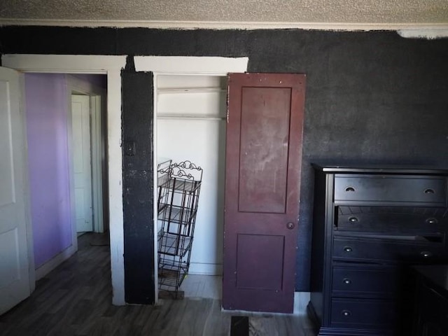 3409 Reed St, Fort Worth, TX 76119 - bedroom featuring dark wood finished floors and baseboards