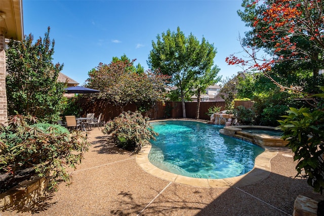 11626 Coronado Trl, Frisco, TX 75033 - view of pool with a patio area, a fenced backyard, and a pool with connected hot tub