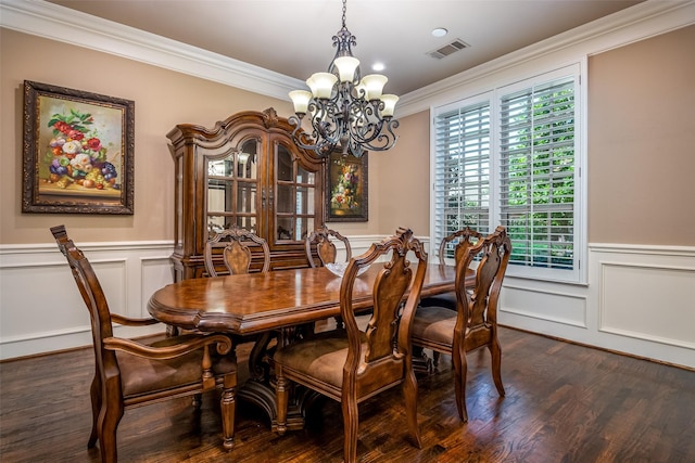 11626 Coronado Trl, Frisco, TX 75033 - dining room featuring a chandelier, ornamental molding, wainscoting, a decorative wall, and wood finished floors