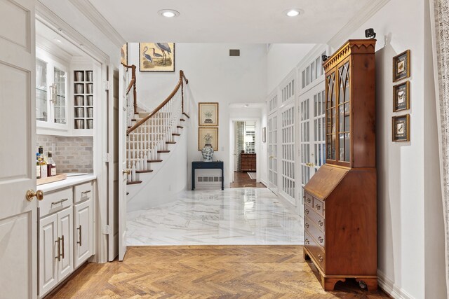 4417 Windsor Ridge Dr, Irving, TX 75038 - entrance foyer with stairs, recessed lighting, french doors, and ornamental molding
