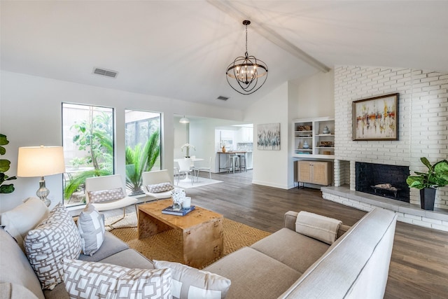 9502 Summerhill Ln, Dallas, TX 75238 - living room featuring wood finished floors, a chandelier, a fireplace, and baseboards