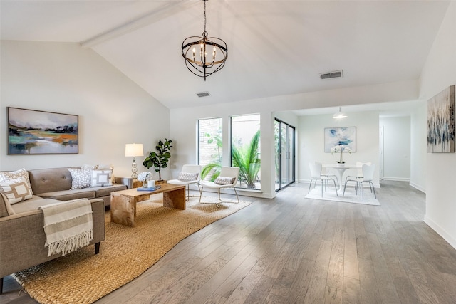 9502 Summerhill Ln, Dallas, TX 75238 - living room with hardwood / wood-style floors, a chandelier, and baseboards
