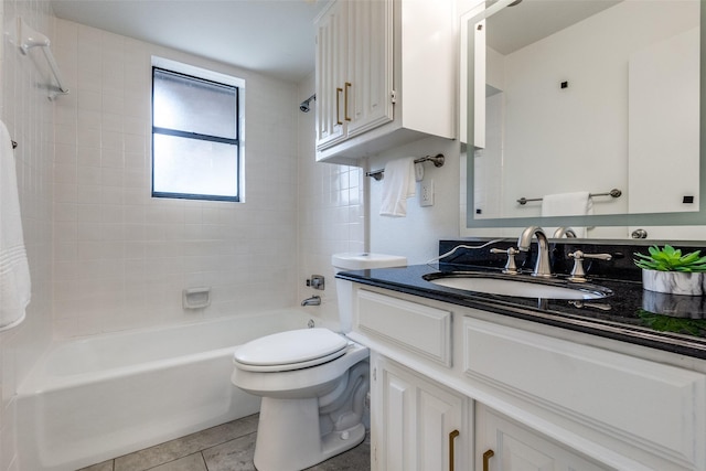 9502 Summerhill Ln, Dallas, TX 75238 - bathroom featuring washtub / shower combination, vanity, toilet, and tile patterned floors