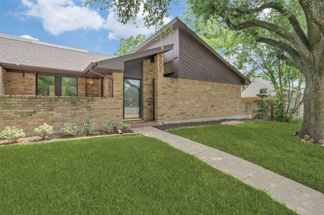 9502 Summerhill Ln, Dallas, TX 75238 - mid-century home with brick siding and a front lawn
