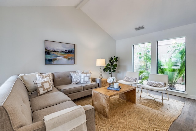 9502 Summerhill Ln, Dallas, TX 75238 - living room featuring wood finished floors, beam ceiling, and high vaulted ceiling