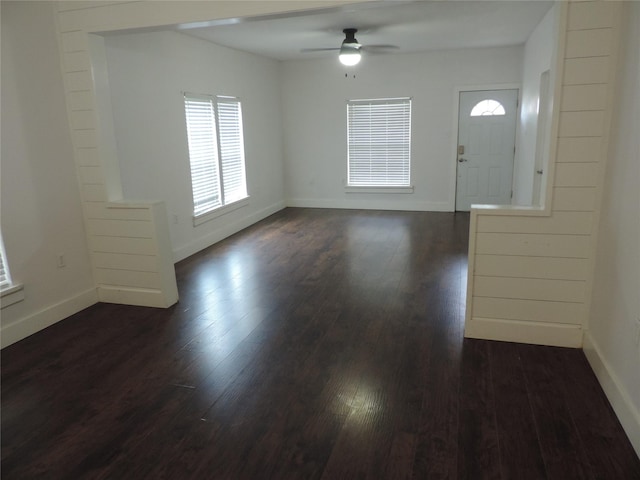 622 N Race, Stephenville, TX 76401 - foyer entrance featuring ceiling fan, dark wood-type flooring, and baseboards
