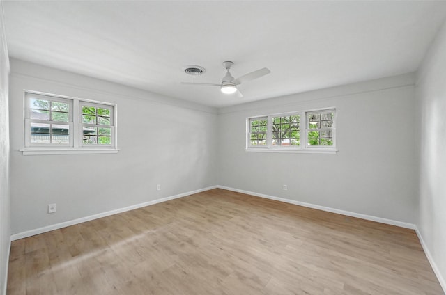 6729 Cylinda Sue Cir, North Richland Hills, TX 76180 - spare room with light wood finished floors and a ceiling fan