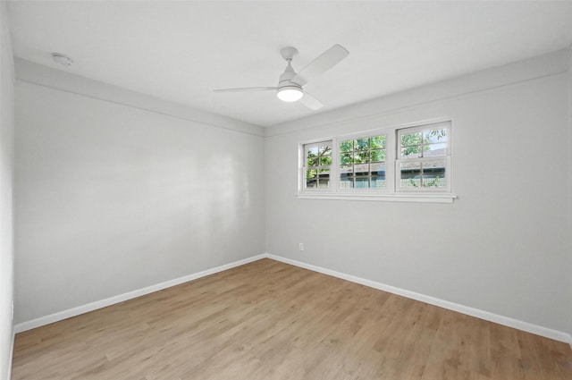 6729 Cylinda Sue Cir, North Richland Hills, TX 76180 - empty room featuring light wood finished floors, a ceiling fan, and a smoke detector