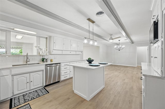6729 Cylinda Sue Cir, North Richland Hills, TX 76180 - kitchen with stainless steel dishwasher, backsplash, white cabinetry, and beamed ceiling