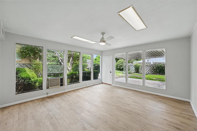 6729 Cylinda Sue Cir, North Richland Hills, TX 76180 - unfurnished sunroom featuring baseboards and wood finished floors
