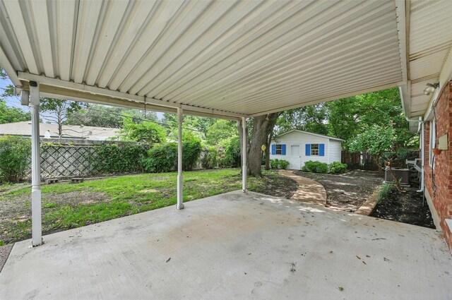 6729 Cylinda Sue Cir, North Richland Hills, TX 76180 - back of house with a patio, an outdoor structure, brick siding, and a lawn
