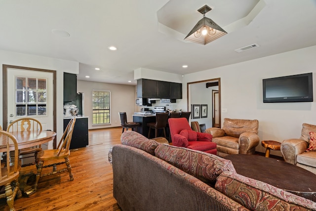 3893 E Fm 906, Powderly, TX 75473 - living area with light wood finished floors and recessed lighting