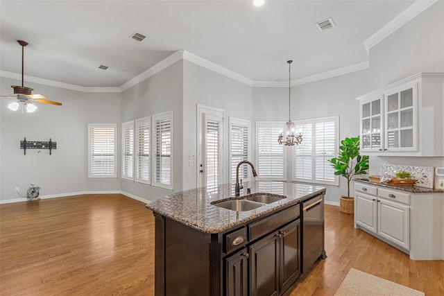 957 Pheasant Dr, Allen, TX 75013 - kitchen with ceiling fan, light wood finished floors, dishwasher, white cabinetry, and light stone counters