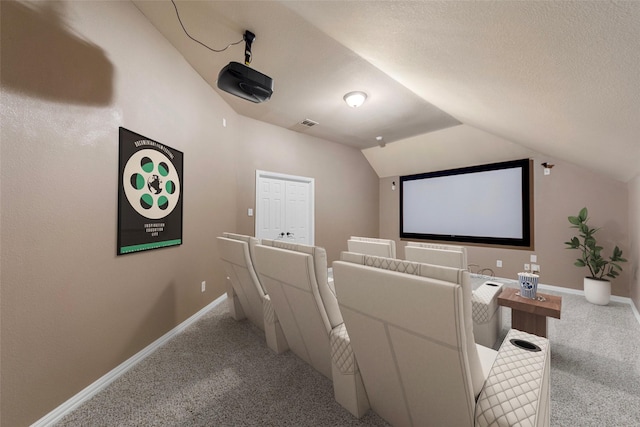 957 Pheasant Dr, Allen, TX 75013 - carpeted home theater room with lofted ceiling and baseboards