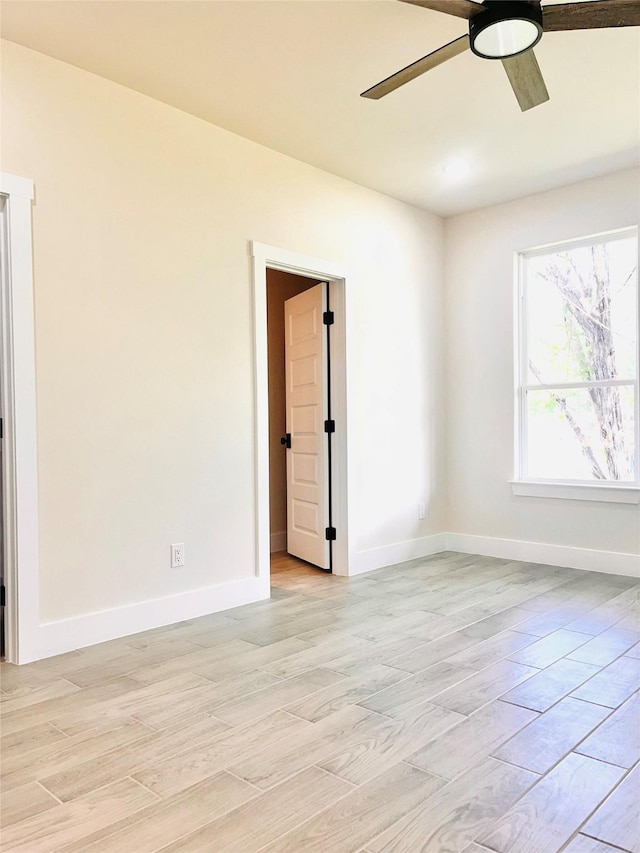 2309 Forest Hill Ln, Granbury, TX 76048 - empty room featuring a ceiling fan, baseboards, and light wood-type flooring
