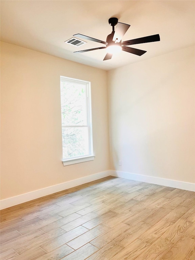 2309 Forest Hill Ln, Granbury, TX 76048 - spare room with light wood finished floors, baseboards, and ceiling fan