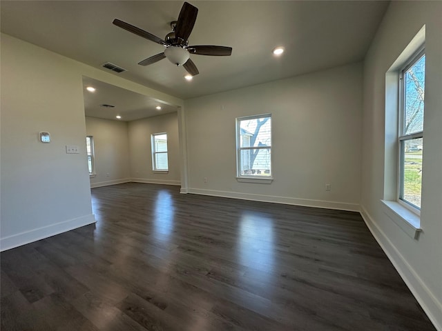 907 Davis St S, Sulphur Springs, TX 75482 - empty room featuring dark wood finished floors, ceiling fan, recessed lighting, and baseboards