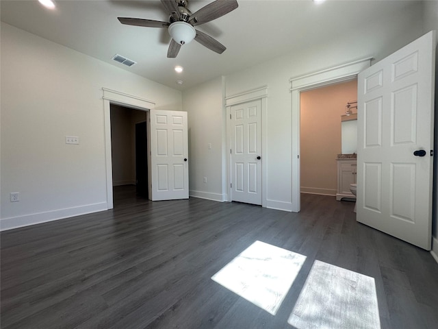 907 Davis St S, Sulphur Springs, TX 75482 - unfurnished bedroom with dark wood-style floors, baseboards, recessed lighting, and ceiling fan