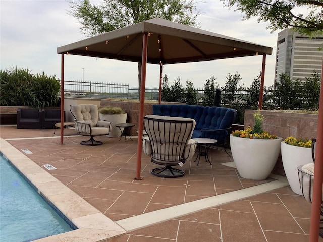 330 Las Colinas Blvd Unit 422, Irving, TX 75039 - view of patio featuring an outdoor living space