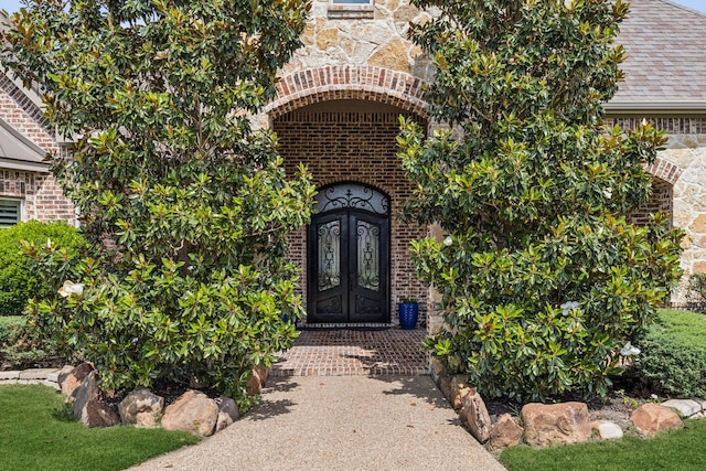 2711 Bauer Ct, Lucas, TX 75002 - view of exterior entry with french doors and brick siding
