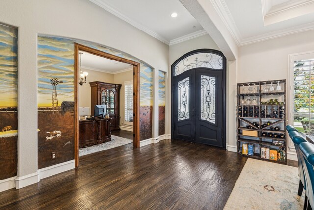 2711 Bauer Ct, Lucas, TX 75002 - entrance foyer featuring french doors, arched walkways, wood finished floors, baseboards, and crown molding